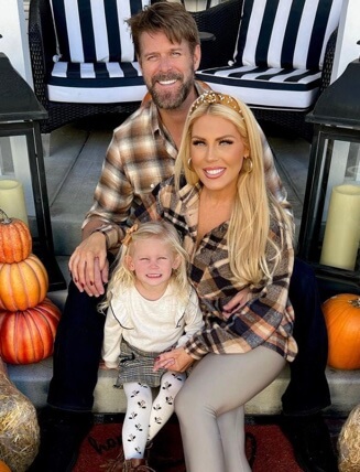 Slade Smiley with his partner and daughter.